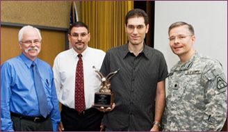 From Left, Jack McClafferty, Arrowhead Program Director; Ray Rampi, Apache Fire Control Procurement Manager; Itai Vishnia, Chief Operating Officer PLX Inc.; Lt. Colonel Scott Bosse, Program Manager Apache Sensors.